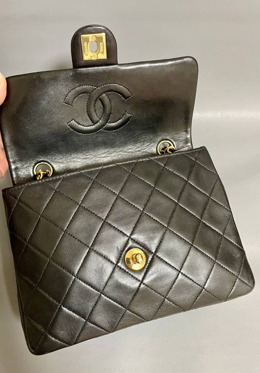 Chanel vintage small flap black lambskin bag