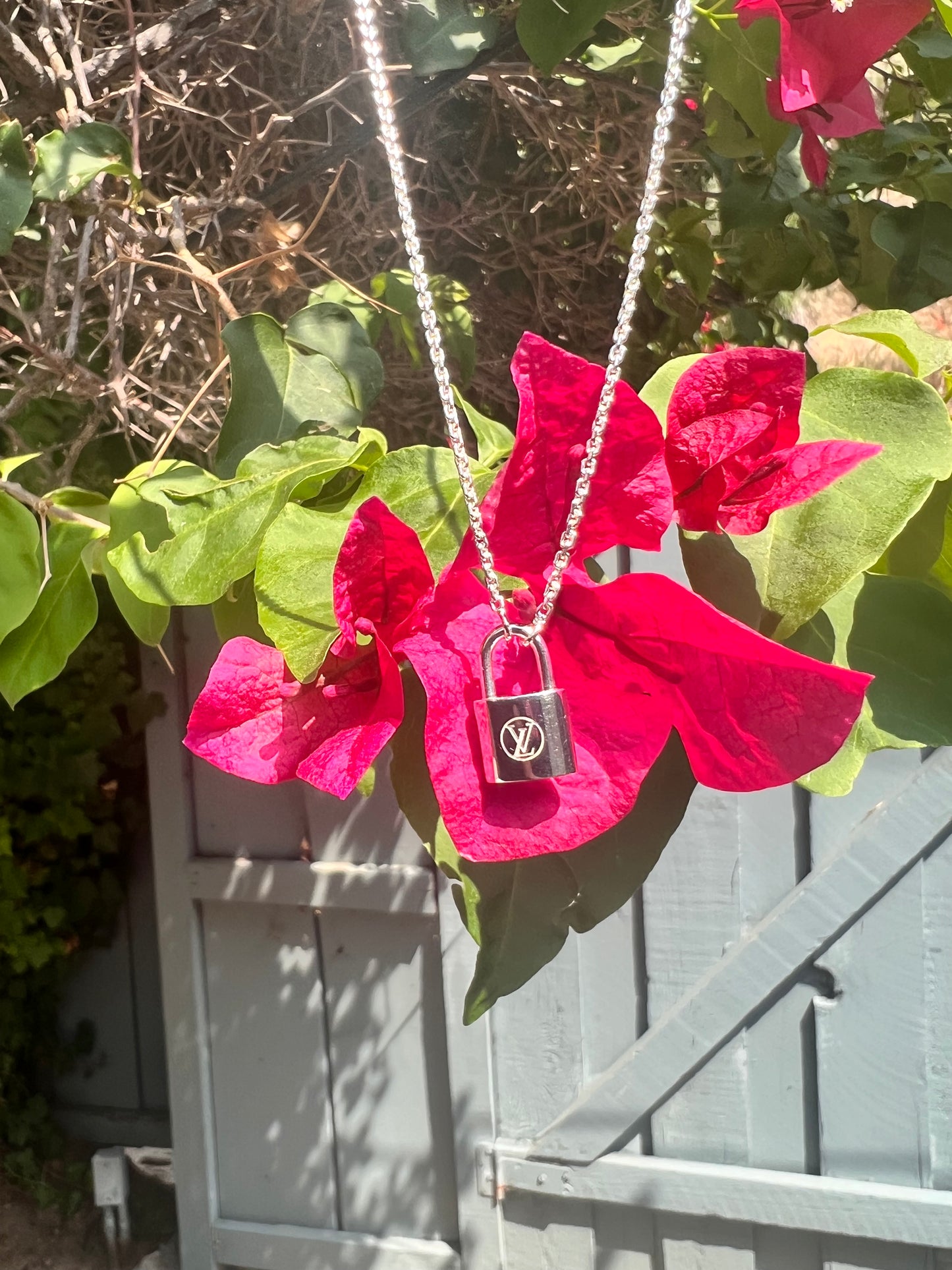 Louis Vuitton Lock It sterling silver pendant necklace