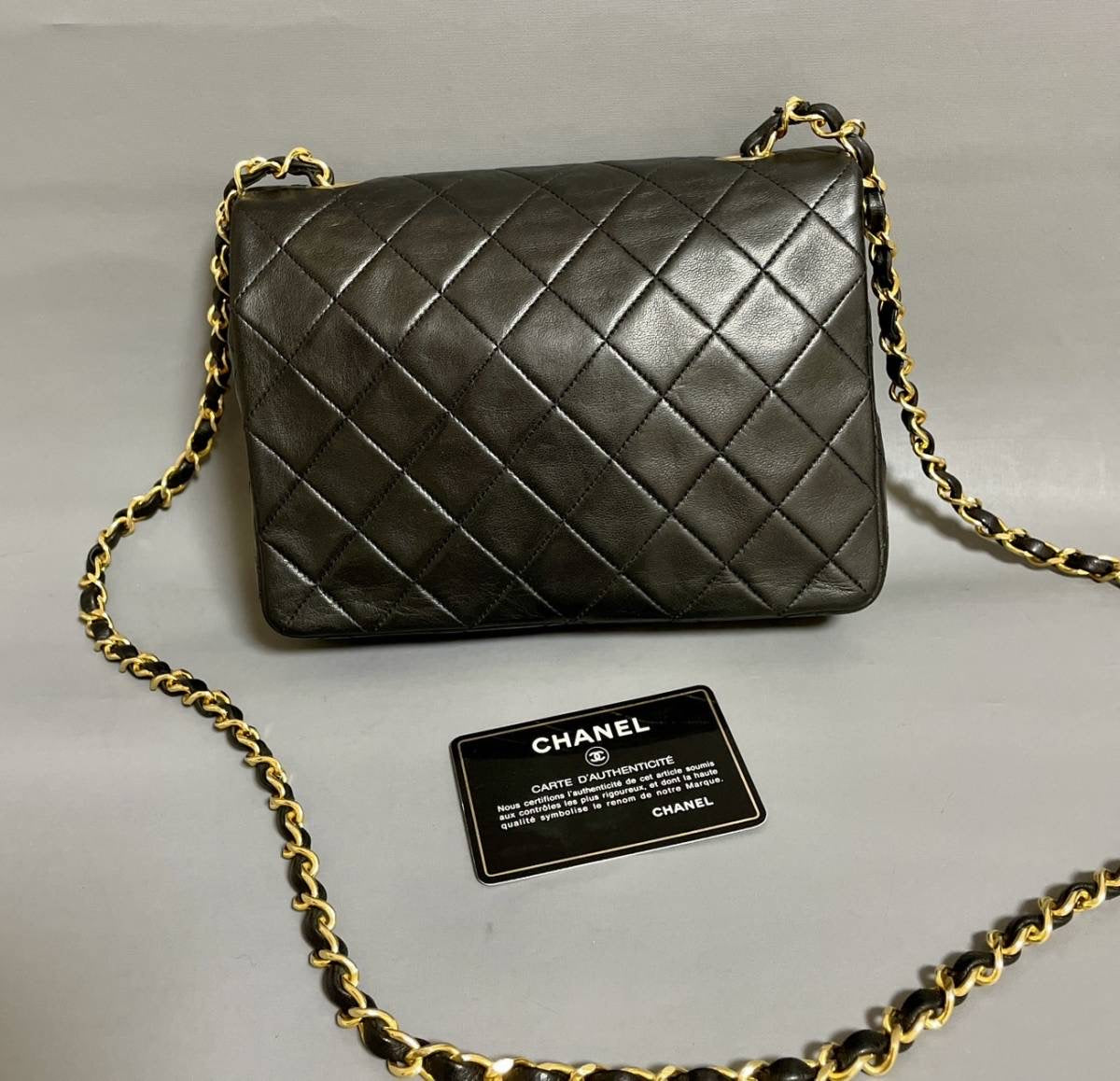 Chanel vintage small flap black lambskin bag