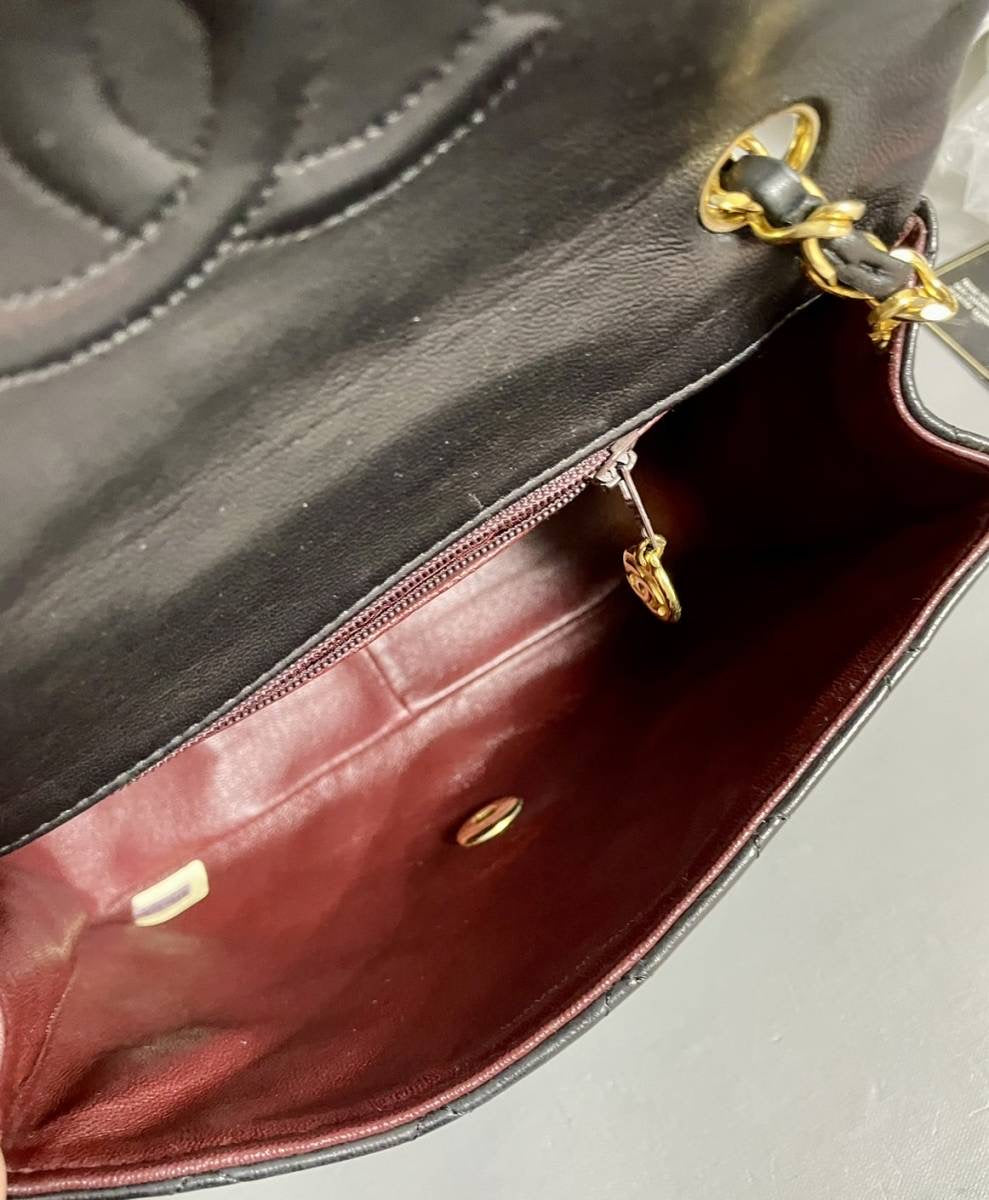Chanel vintage small flap black lambskin bag