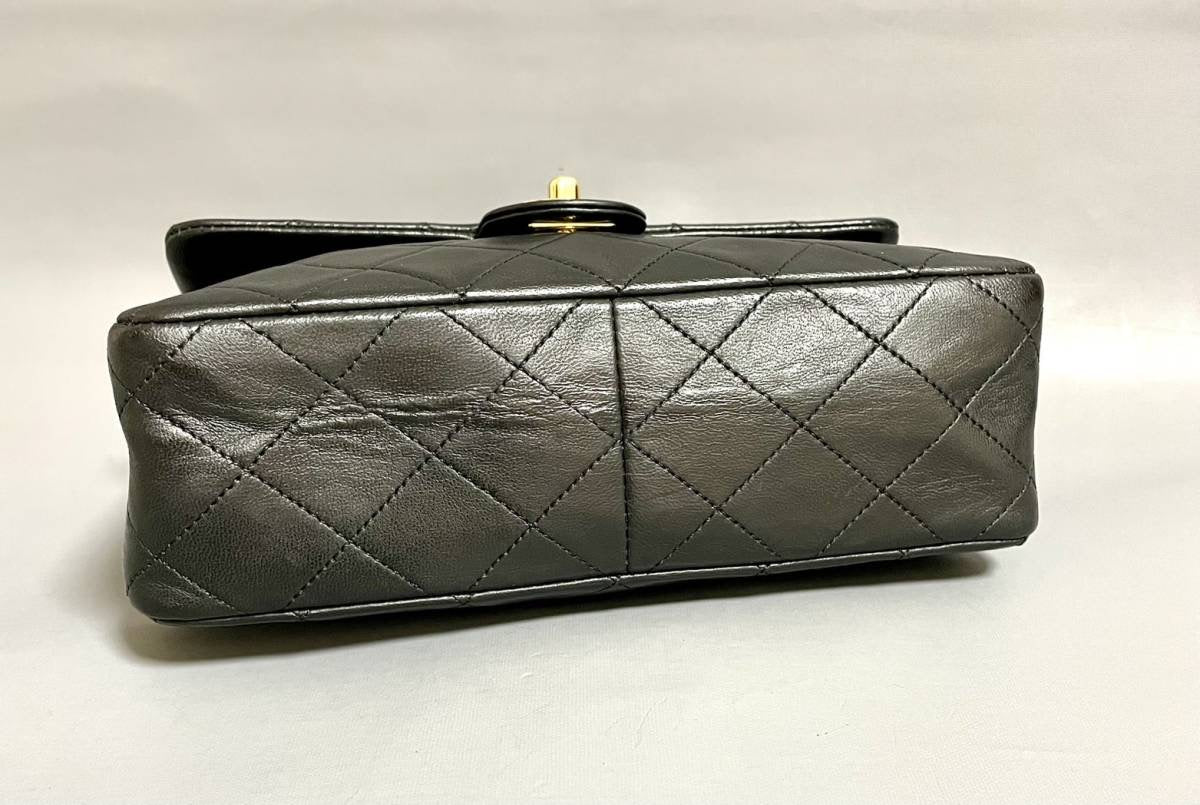 Chanel vintage small flap black lambskin bag