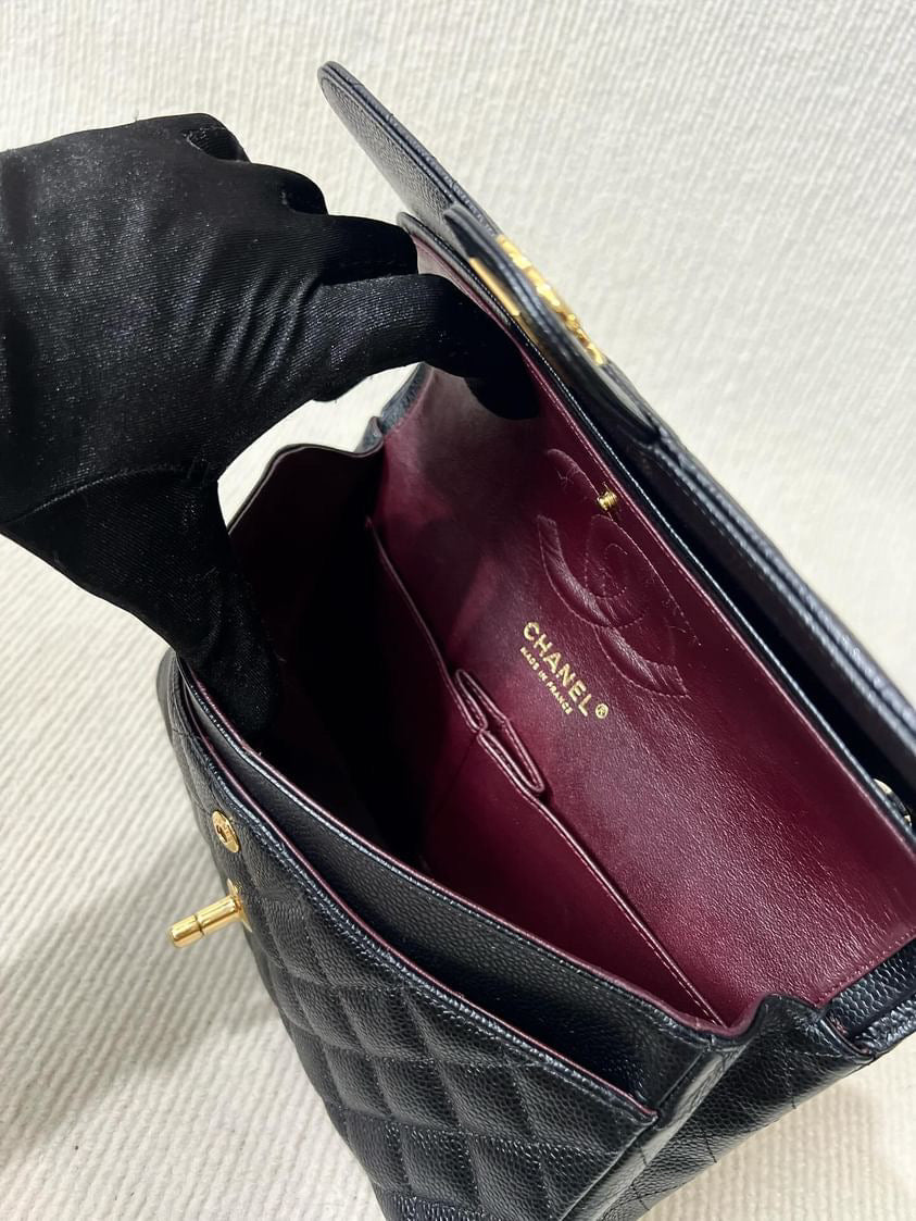 Chanel black caviar medium classic flap GHW