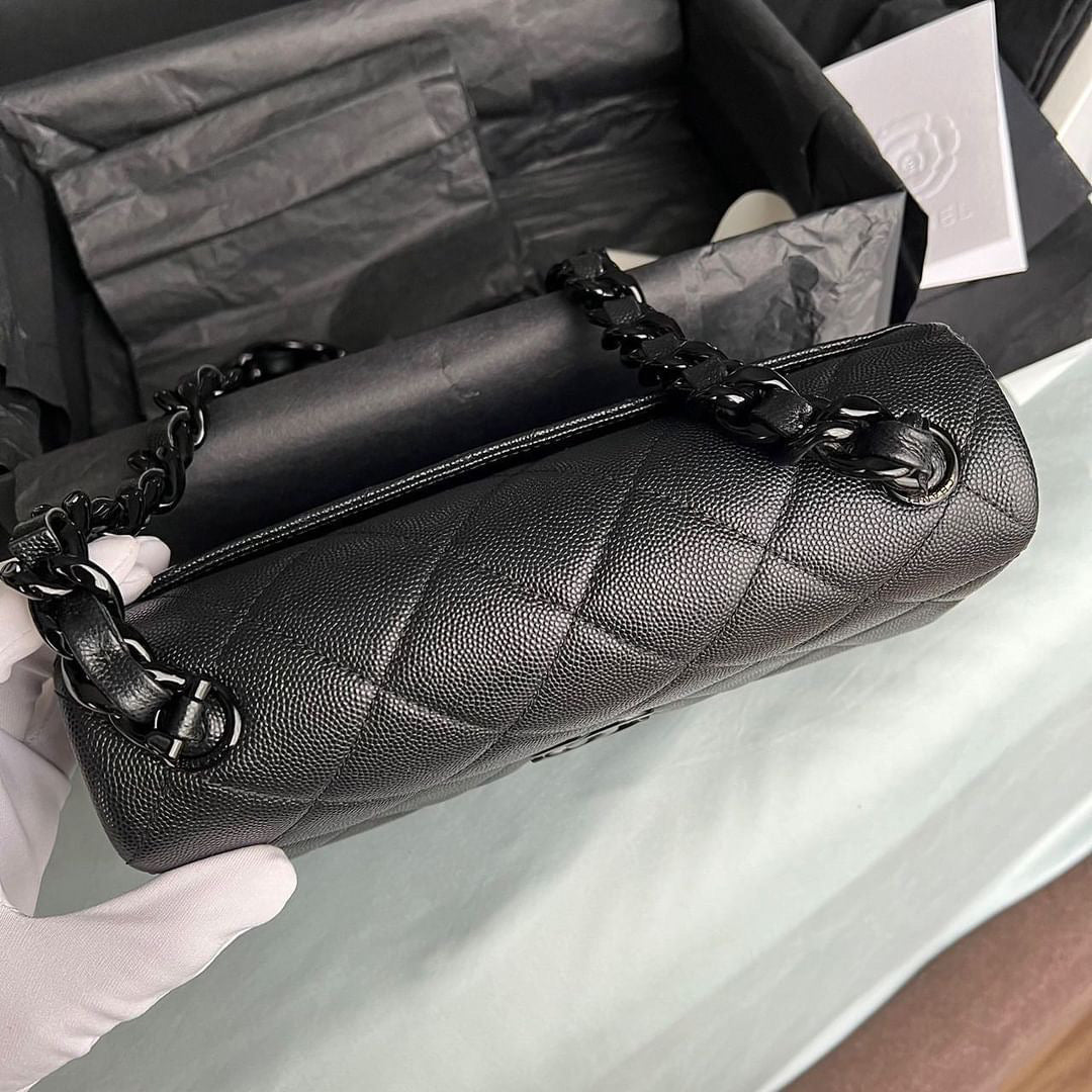 Chanel black caviar so black small flap