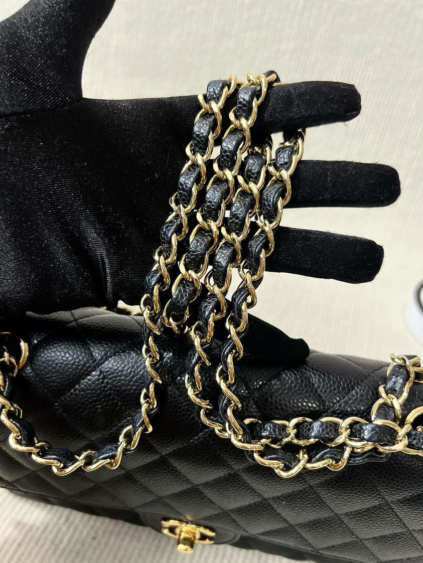 Chanel black caviar medium classic flap GHW