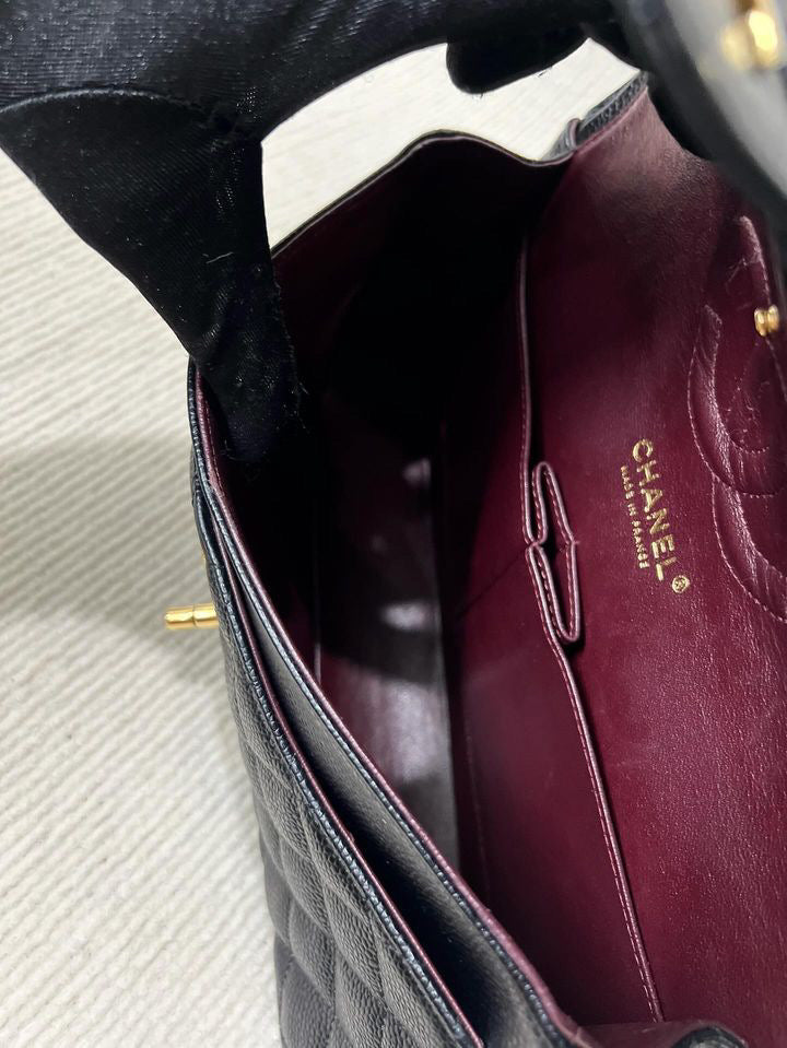 Chanel black caviar medium classic flap GHW
