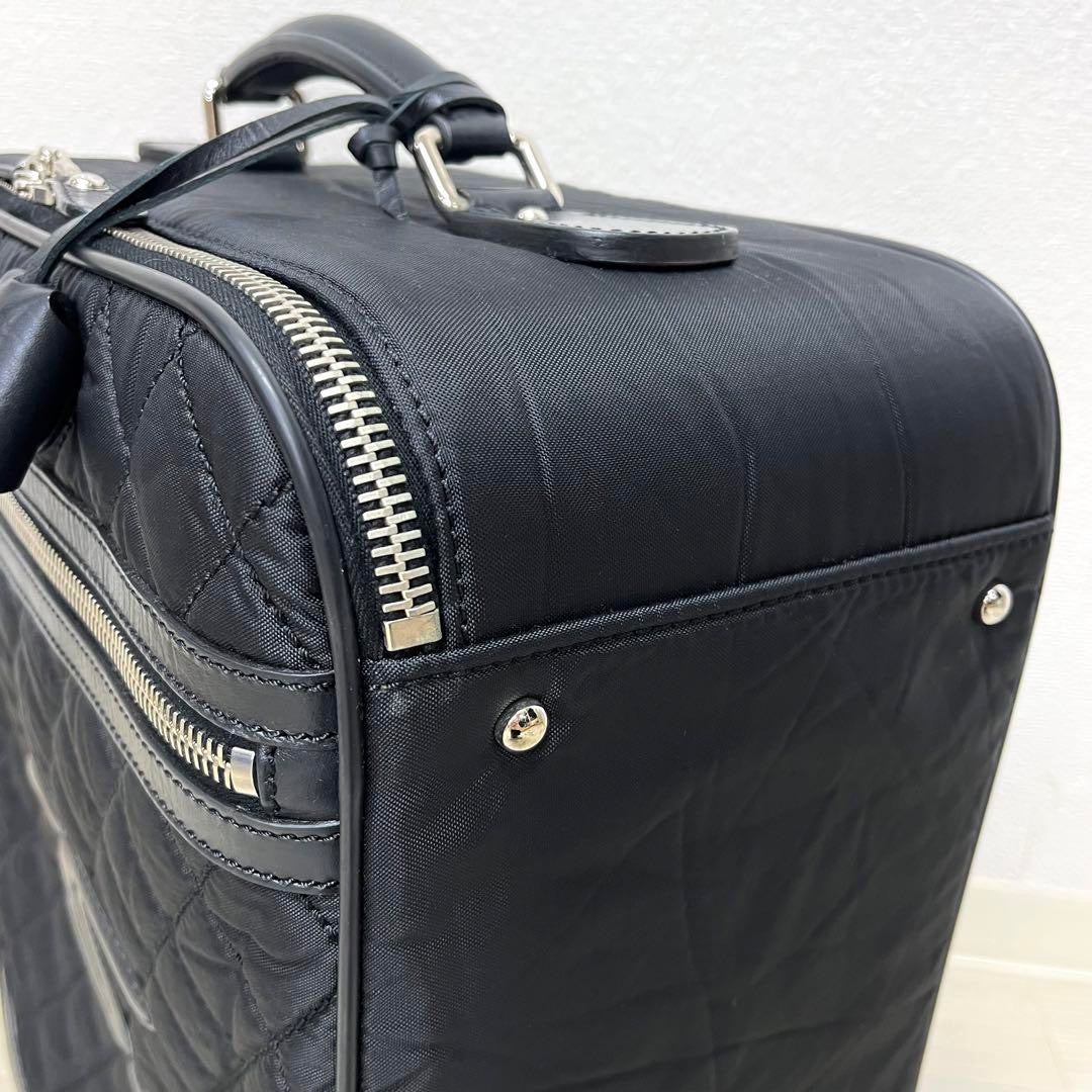 Chanel quilted fabric CC roller carry on travel suitcase