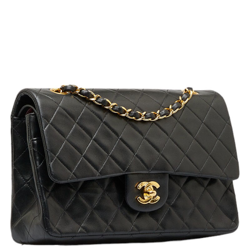 Chanel vintage medium classic flap black lambskin 24k gold hardware flap bag