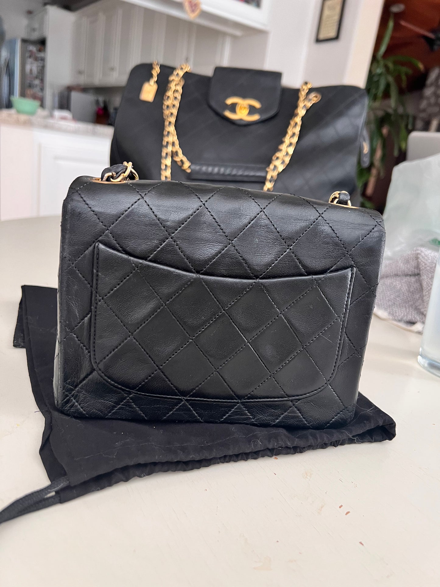 Chanel vintage mini square black lambskin 24k ghw