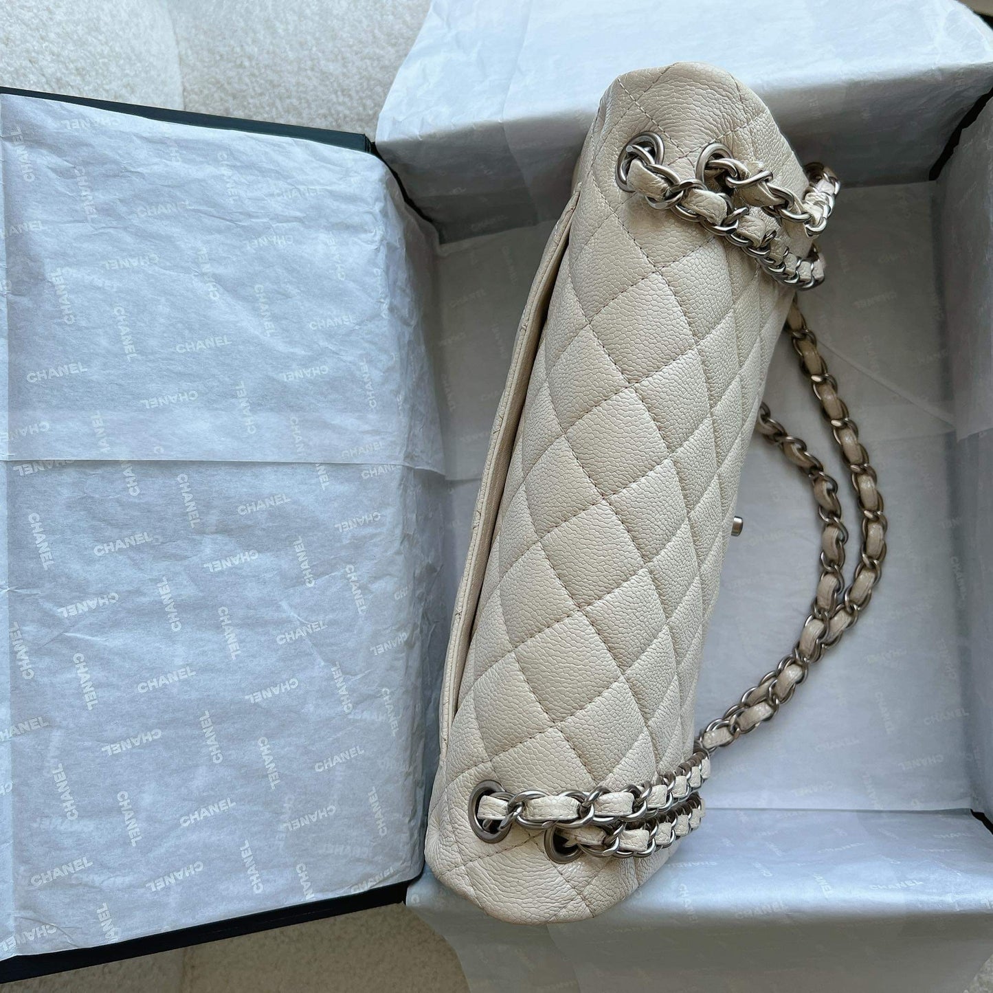 Chanel beige caviar jumbo double flap