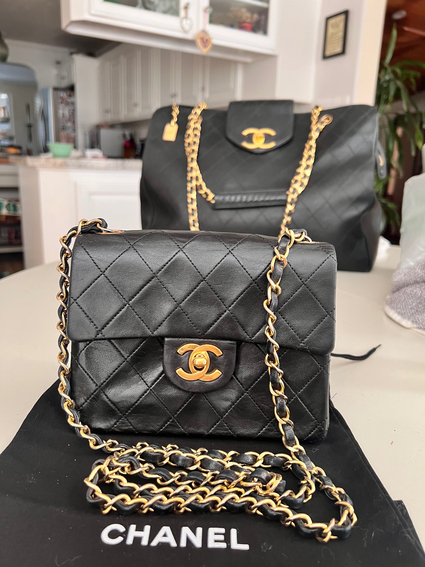 Chanel vintage mini square black lambskin 24k ghw