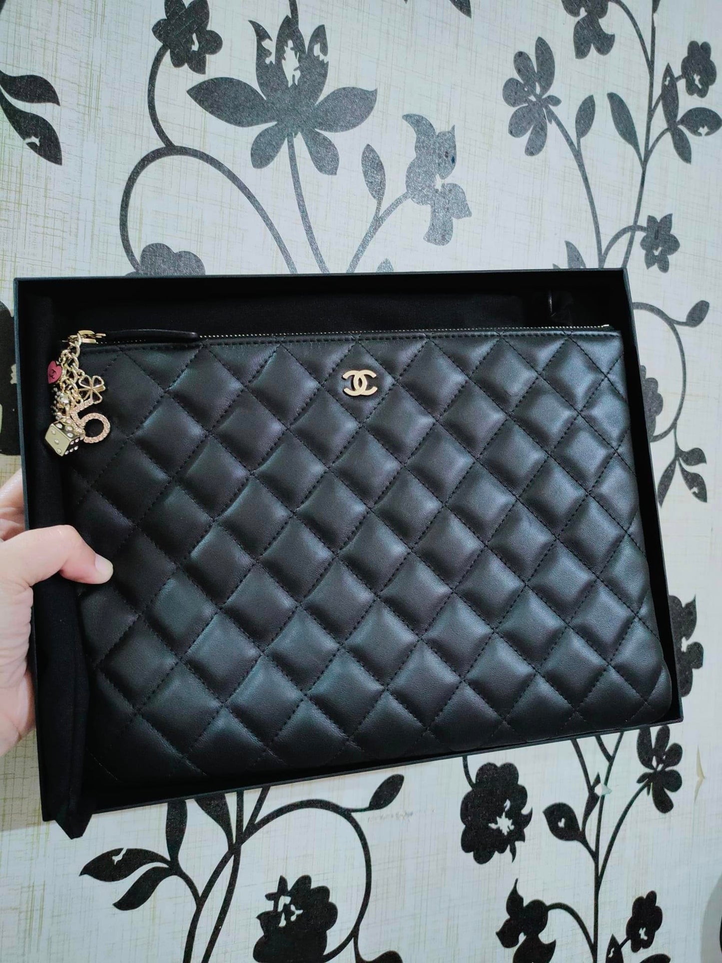 Chanel O clutch lambskin with charm zipper