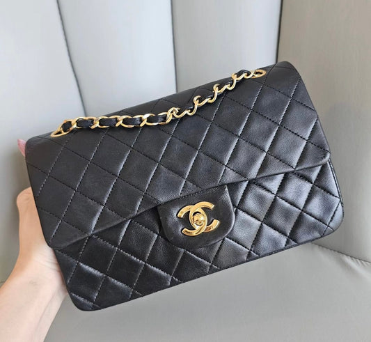 Chanel vintage small black lambskin classic flap handbag