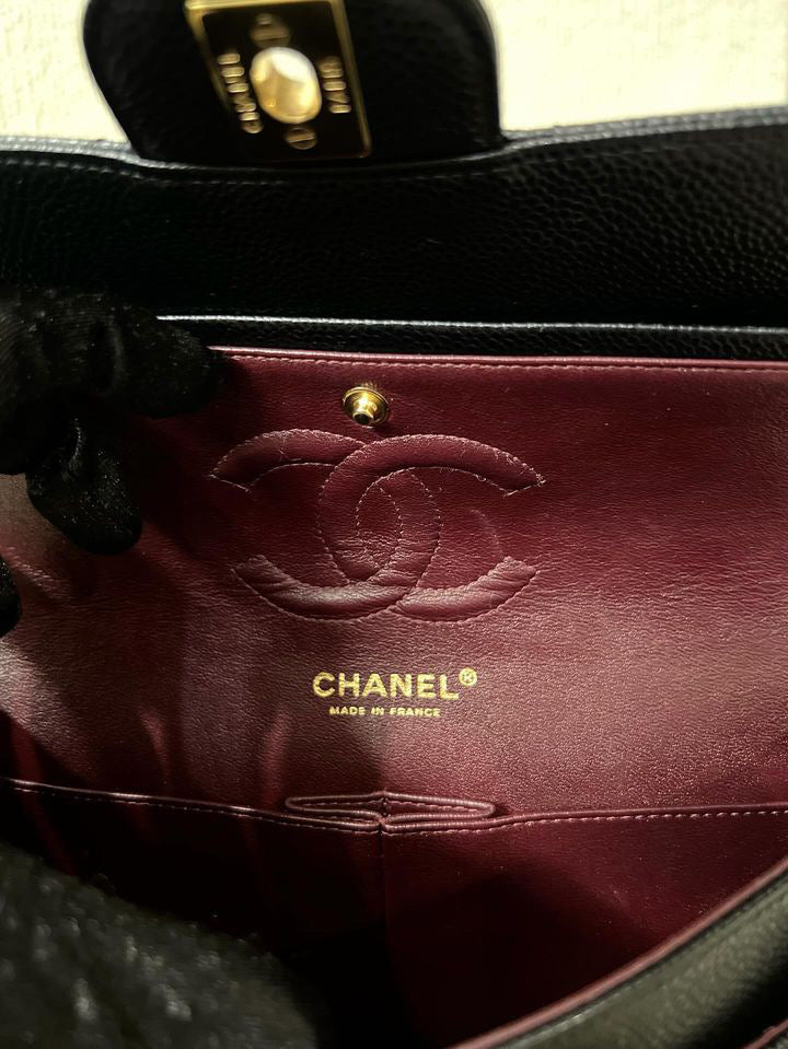 Chanel black caviar medium classic flap GHW