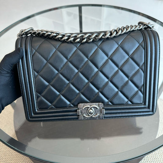 Chanel medium black quilted smooth calfskin boy handbag