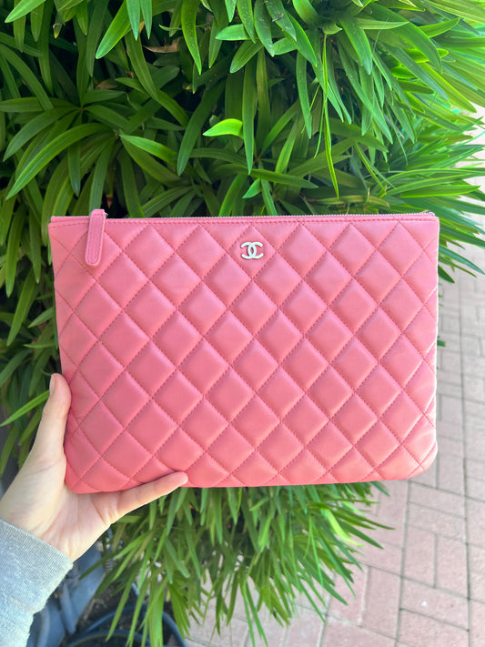 Chanel pink lambskin medium O pouch