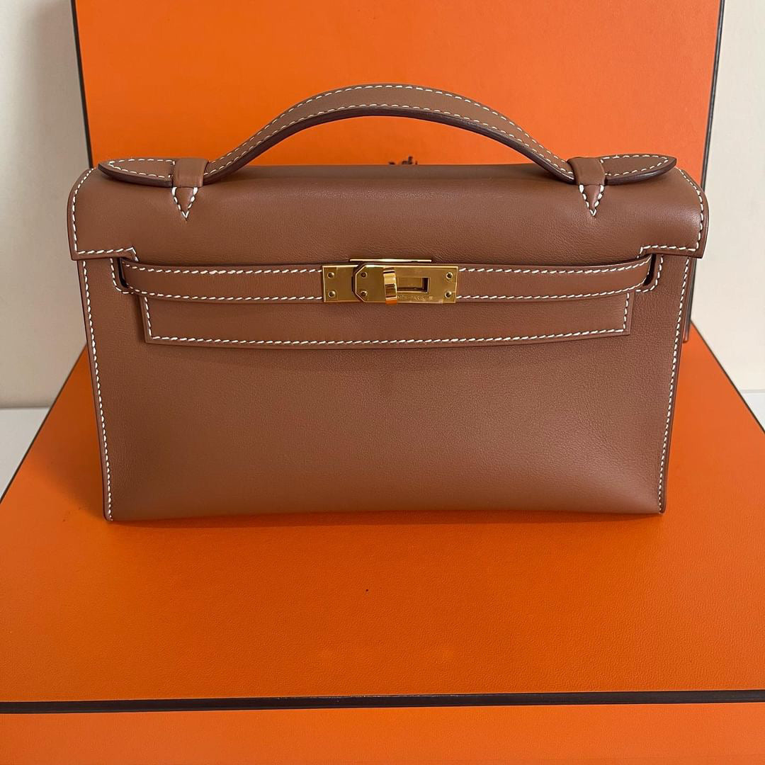 Hermes Kelly pochette gold on gold GHW swift stamp U