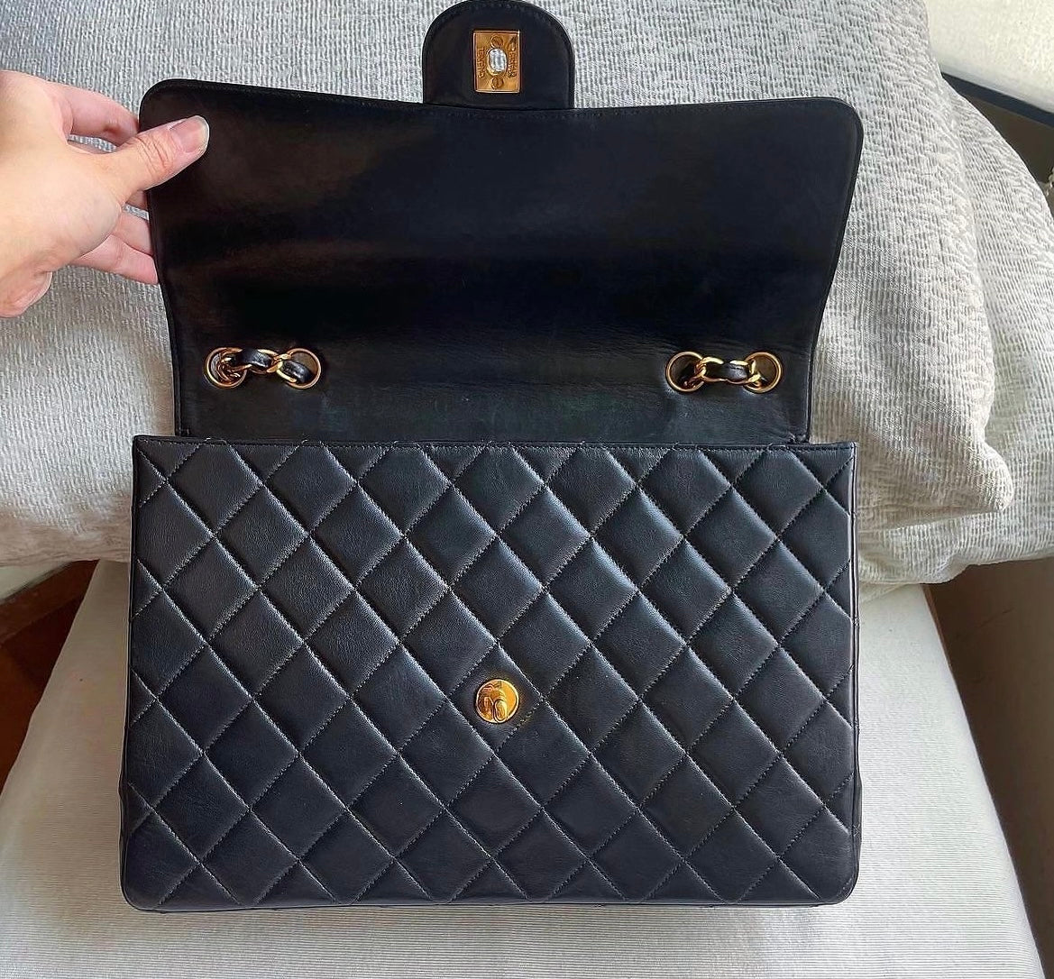 Chanel vintage jumbo black lambskin flap bag
