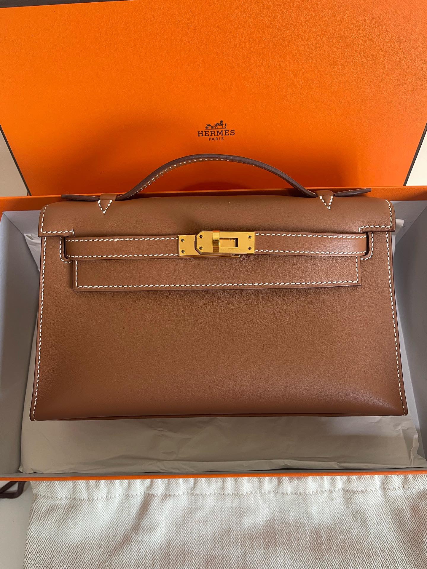 Hermes Kelly pochette gold on gold GHW swift stamp U