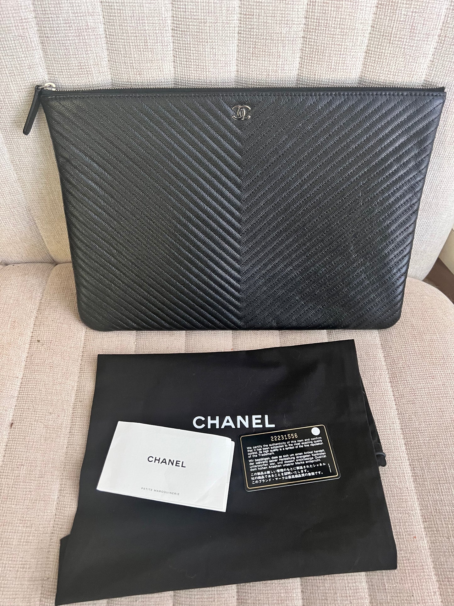 Chanel Large black caviar thin chevron O pouch