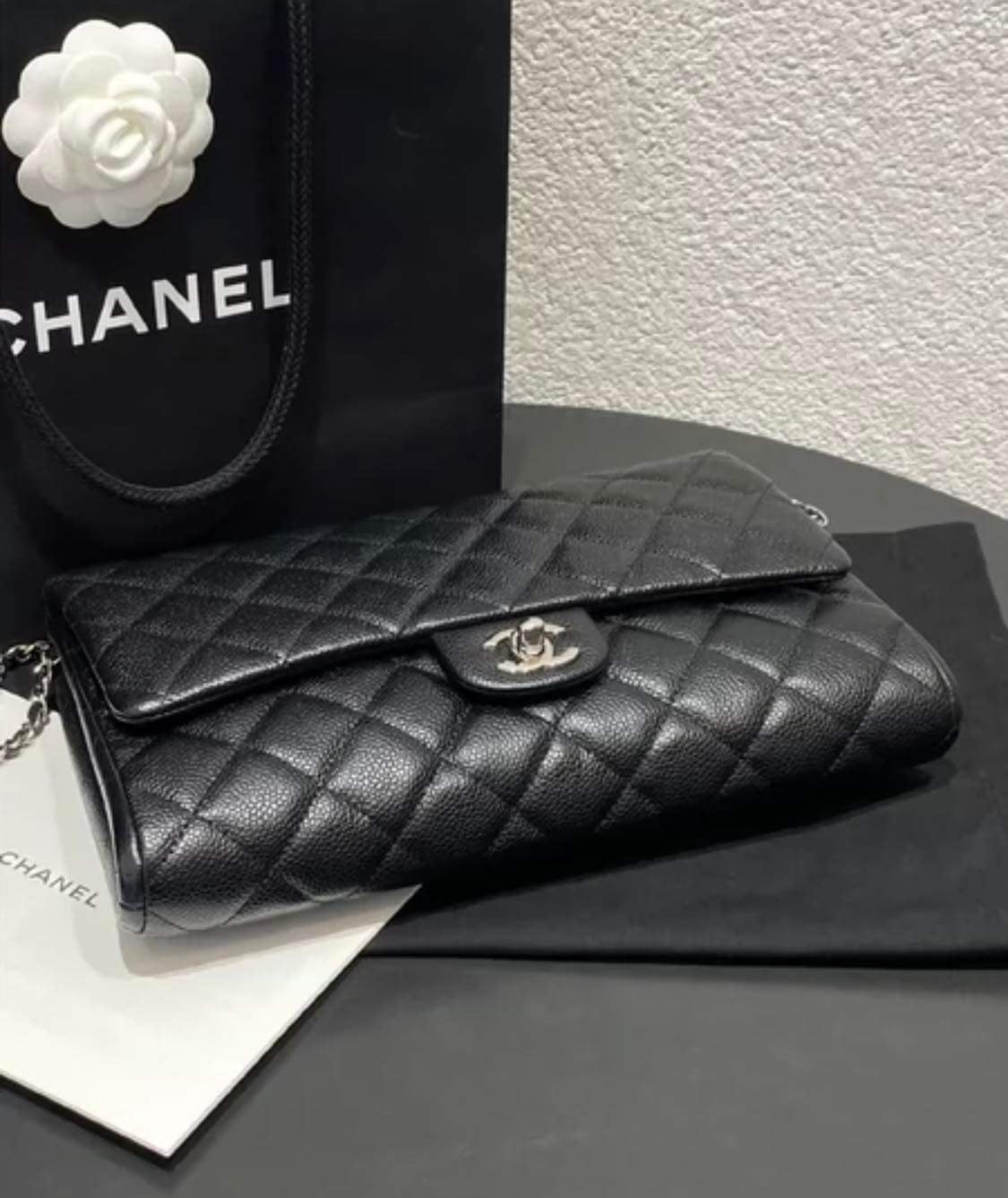 Chanel black caviar SHW clutch on chain