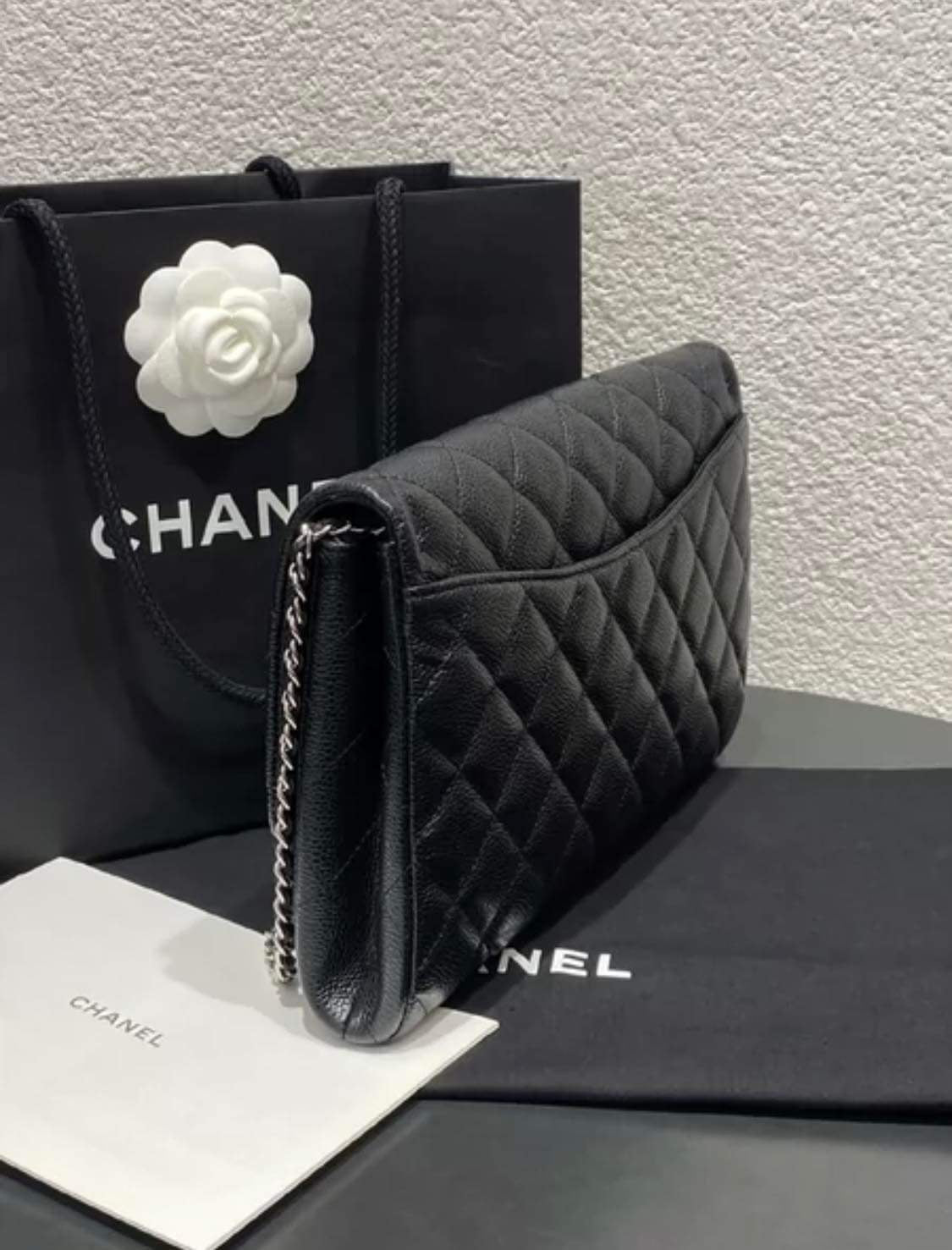 Chanel black caviar SHW clutch on chain