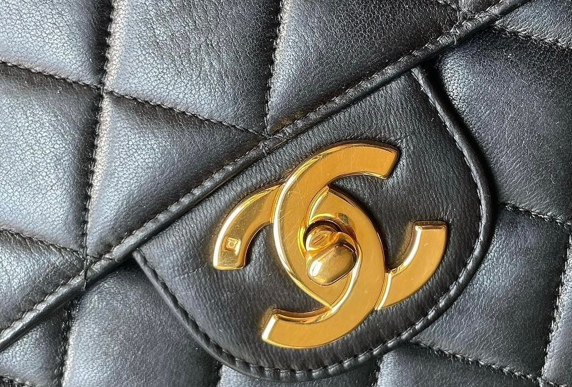 Chanel vintage jumbo black lambskin flap bag