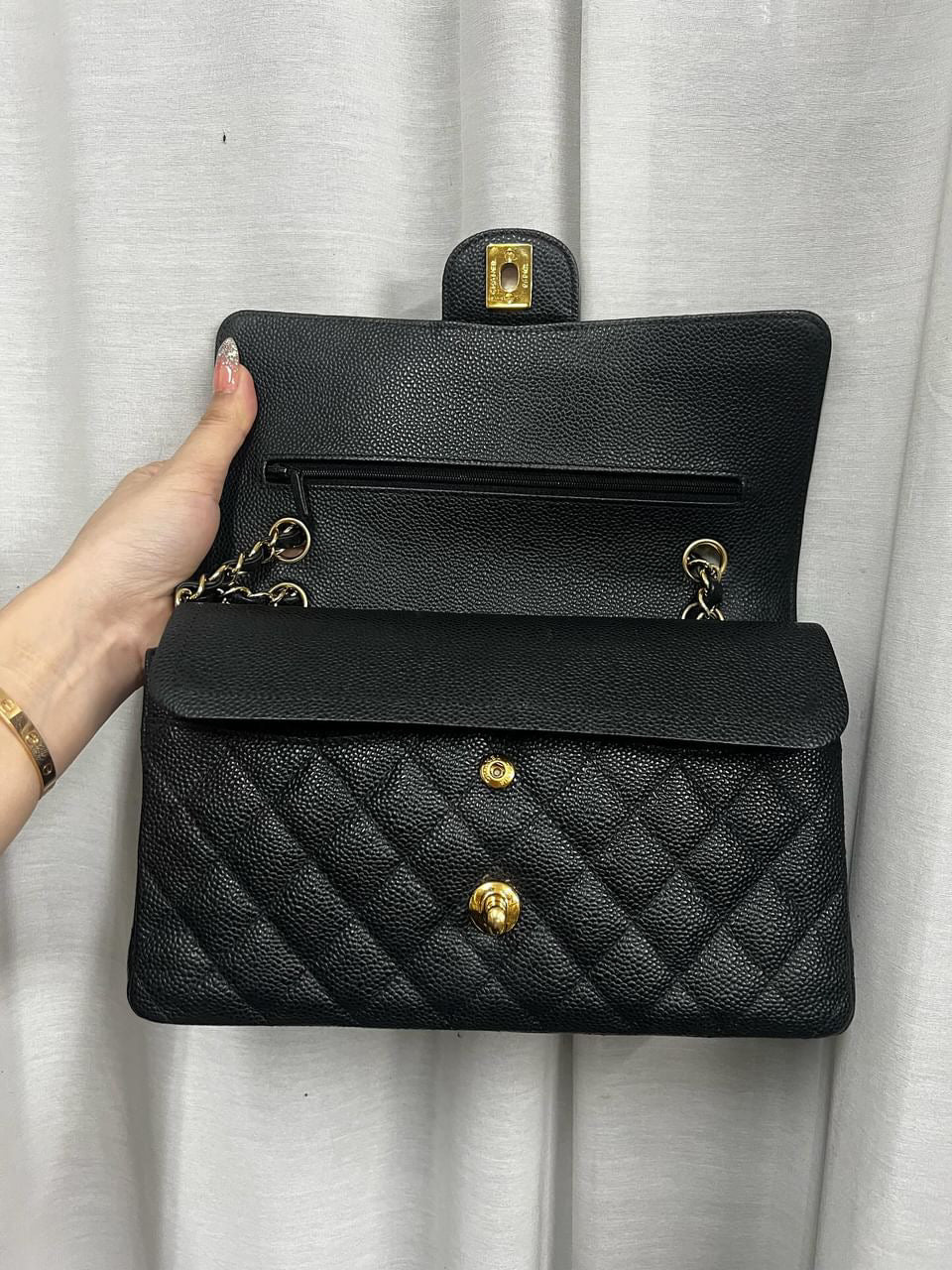 Chanel black caviar medium classic flap gold hardware