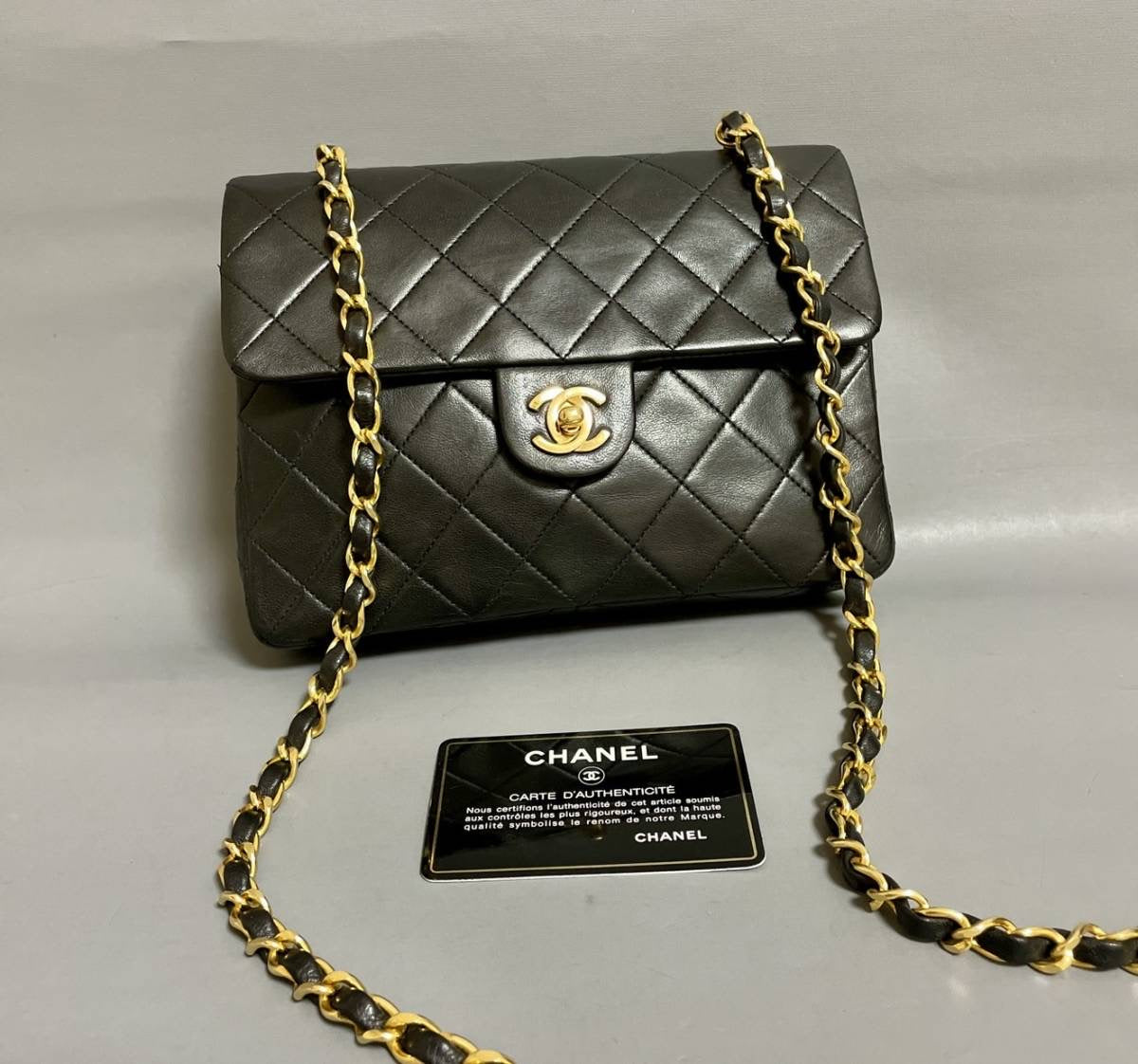Chanel vintage small flap black lambskin bag