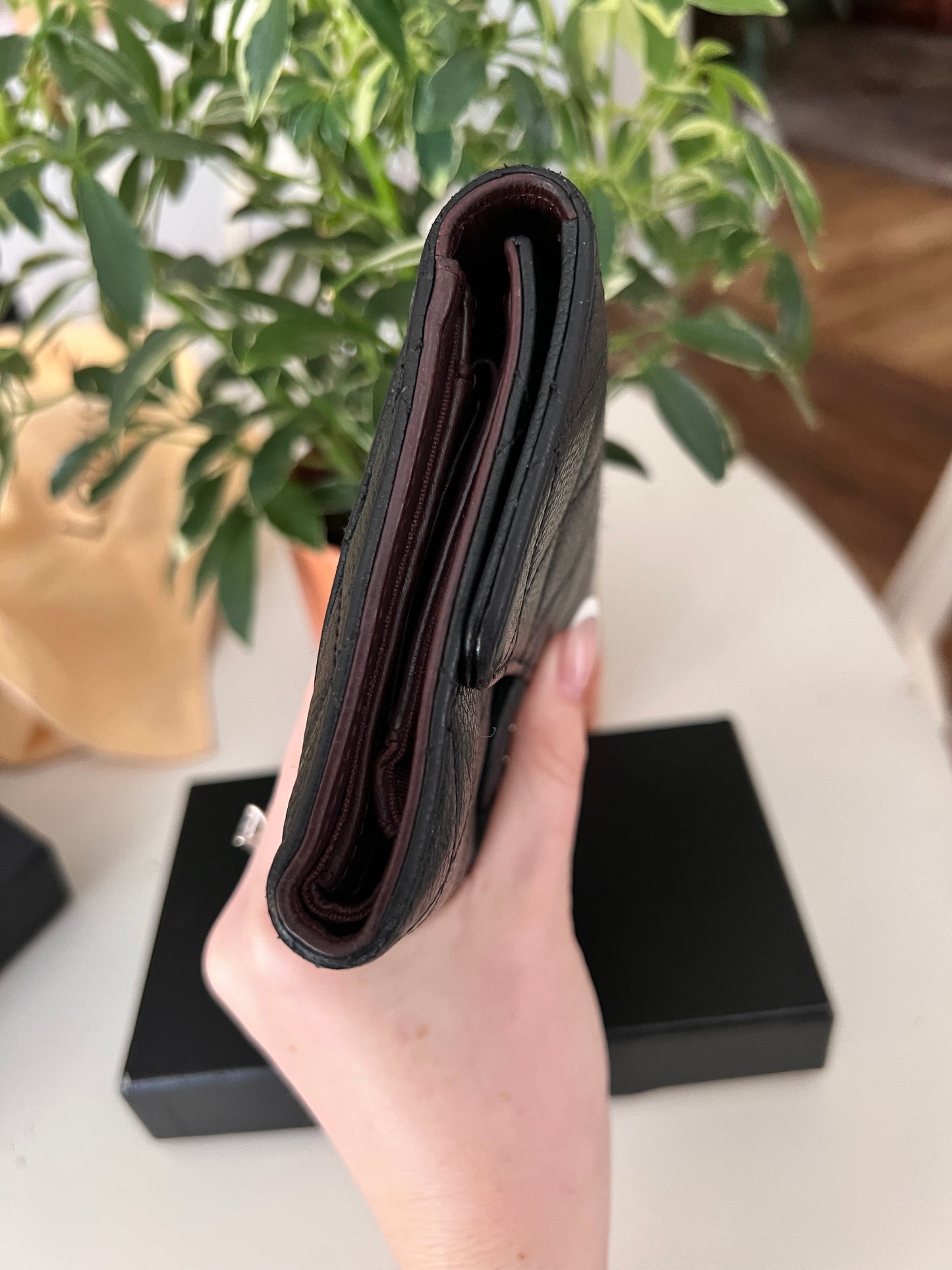 Chanel black caviar trifold flap long wallet