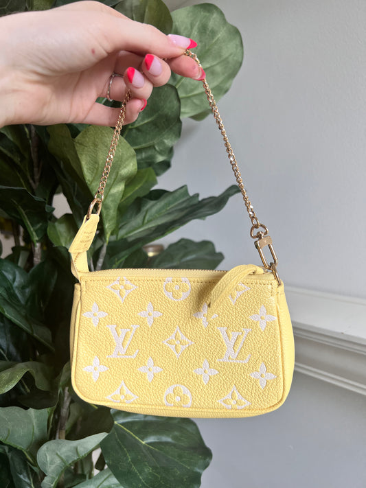 Limited Edition Louis Vuitton 2022 spring collection  yellow empreinte mini pochette accessories